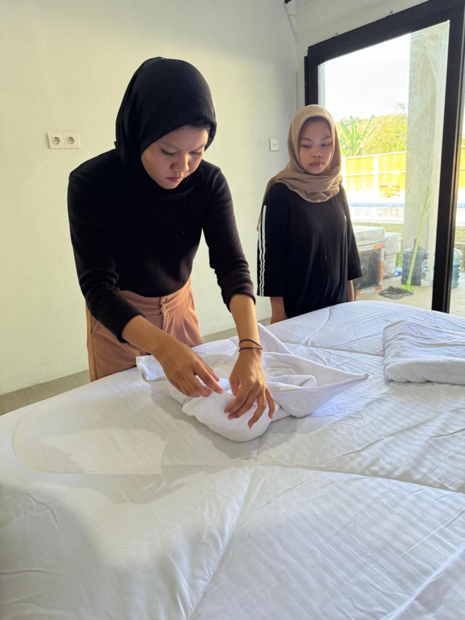 Satu Hati Hotel Ekas Buitenkant foto