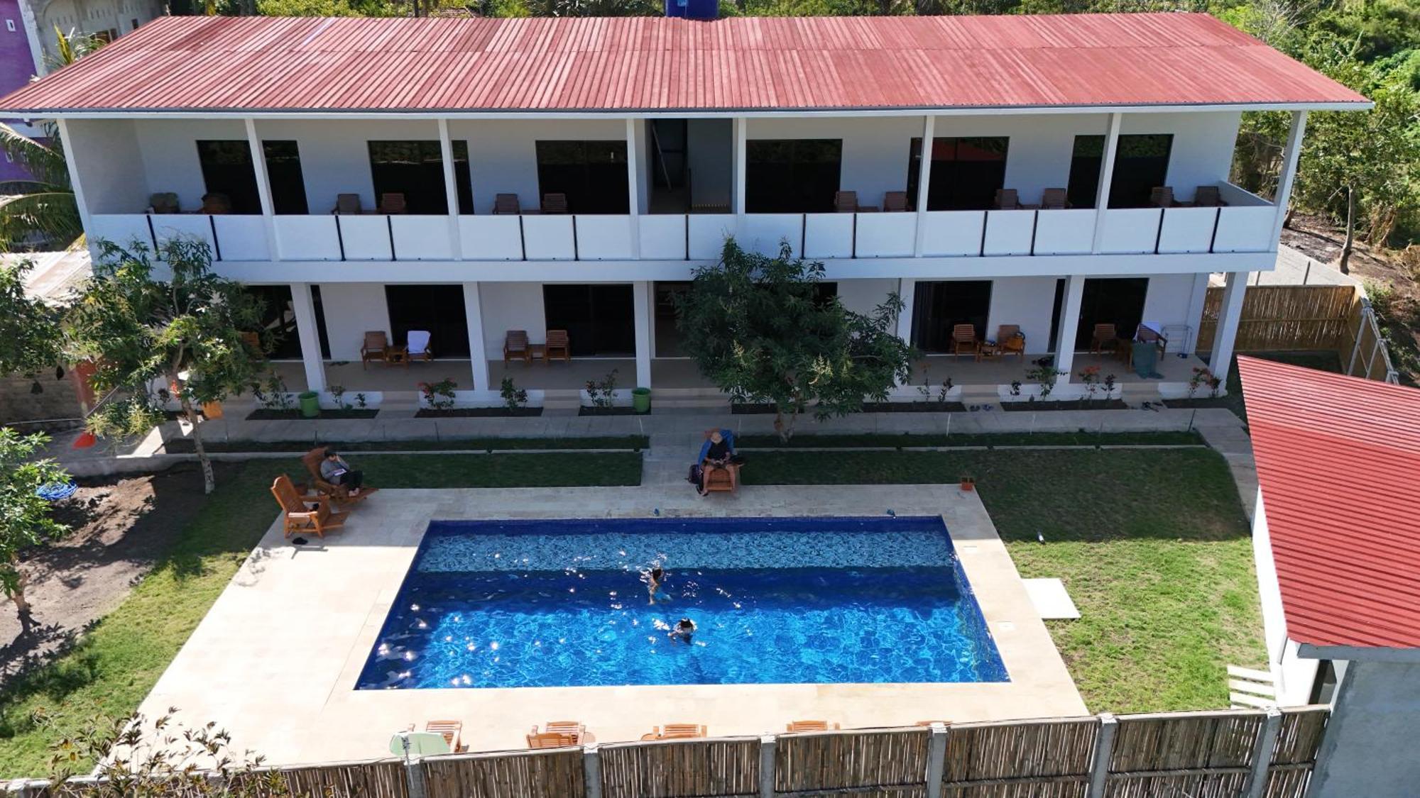 Satu Hati Hotel Ekas Buitenkant foto