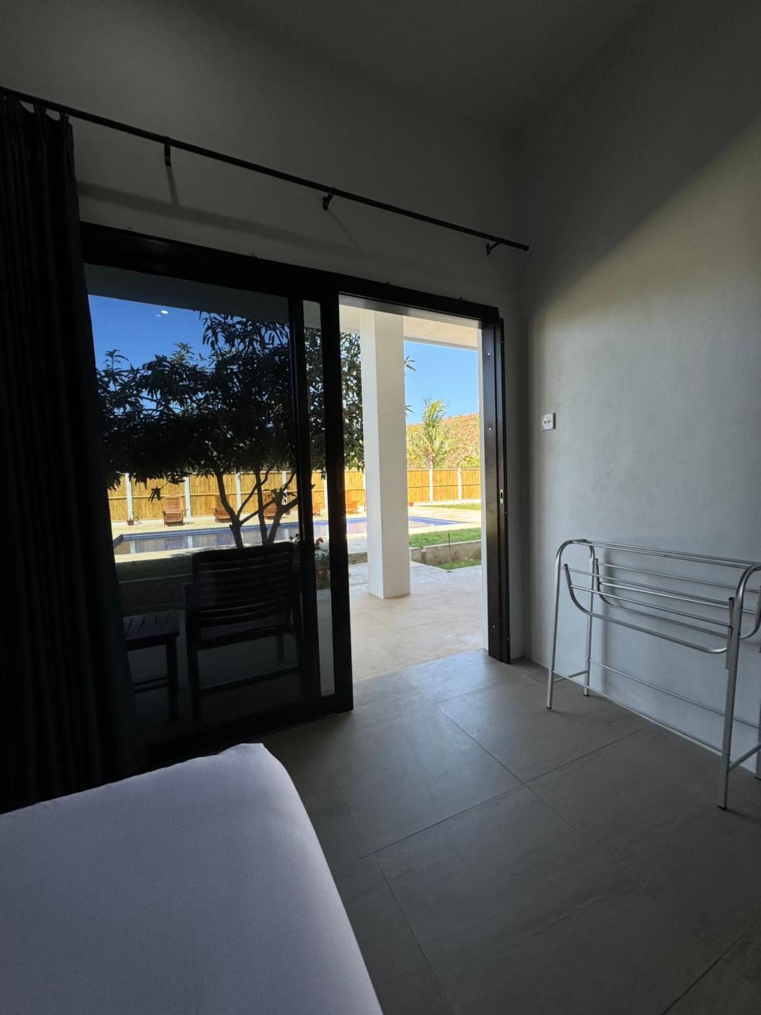 Satu Hati Hotel Ekas Buitenkant foto